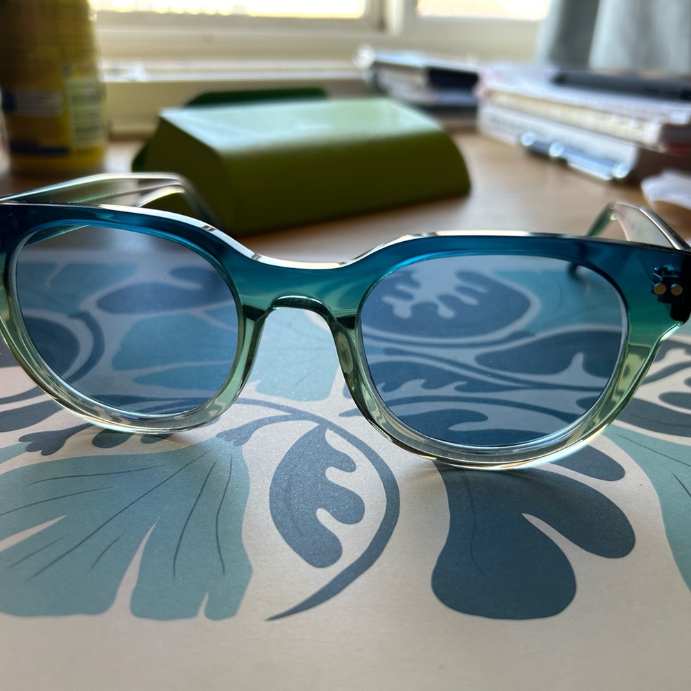 See brand unisex sunglasses.  blue green. brand new.